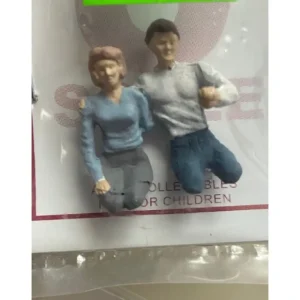 Figures-A1291 - Driving Couple - Quality Trains and Accessories Galore